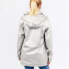 Women's beige metallic raincoat, Breizh Océan, Guidel. Women's waterproof garment with heat-sealed seams, waterproof, back view.